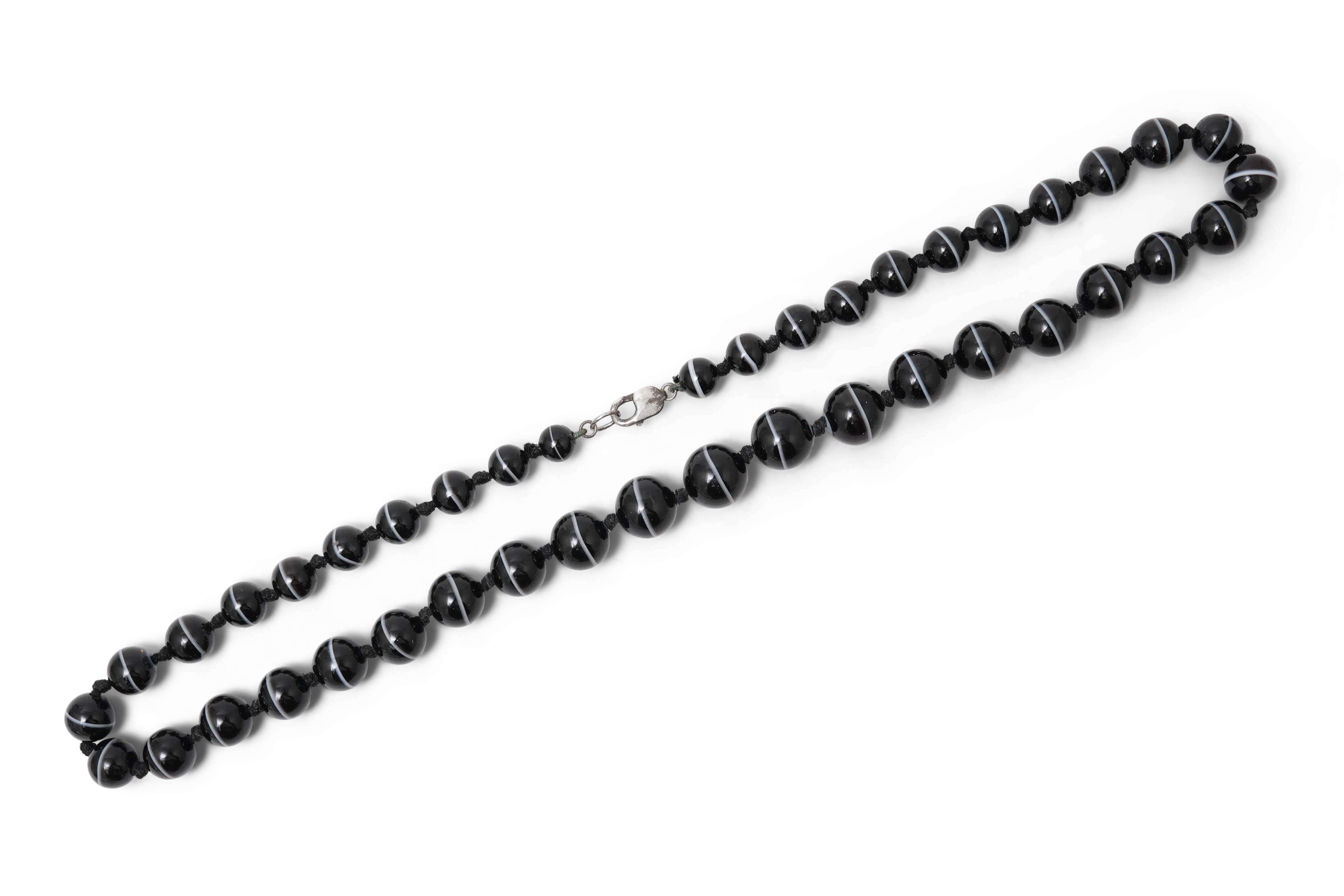 A banded onyx bead necklace, early 20th century